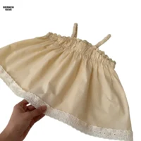 تصویر تاپ کتان دخترانه رنگ کرم مناسب استایل بهاره و تابستانه