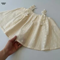 استایل شیک و فرم کلوش تاپ دخترانه رنگ شیری