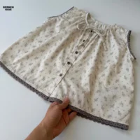 شومیز تاپ دخترانه گل گلی استین حلفهگل های بنفش بادمجانی