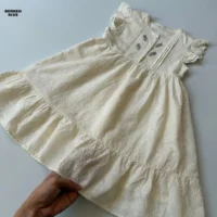 مدل لباس دخترانه استین کوتاه نخی با طرح وینتیج و گلدوزی های کوچک