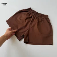 شورتک بچه گانه دخترانه قهوه ای جیب دار کتان