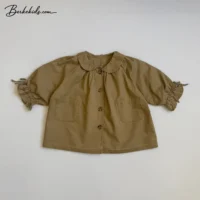 کت بهاره دخترانه رنگ خاکی با جیب‌های پاکتی و طراحی مینیمال