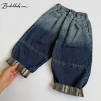 شلوار جین مام استایل پسرانه آبی تیره تینت‌دار مناسب ۲ تا ۶ سال